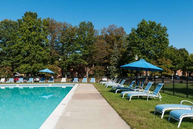 The Metropolitan Tareyton Estates - swimming pool with lounge chairs